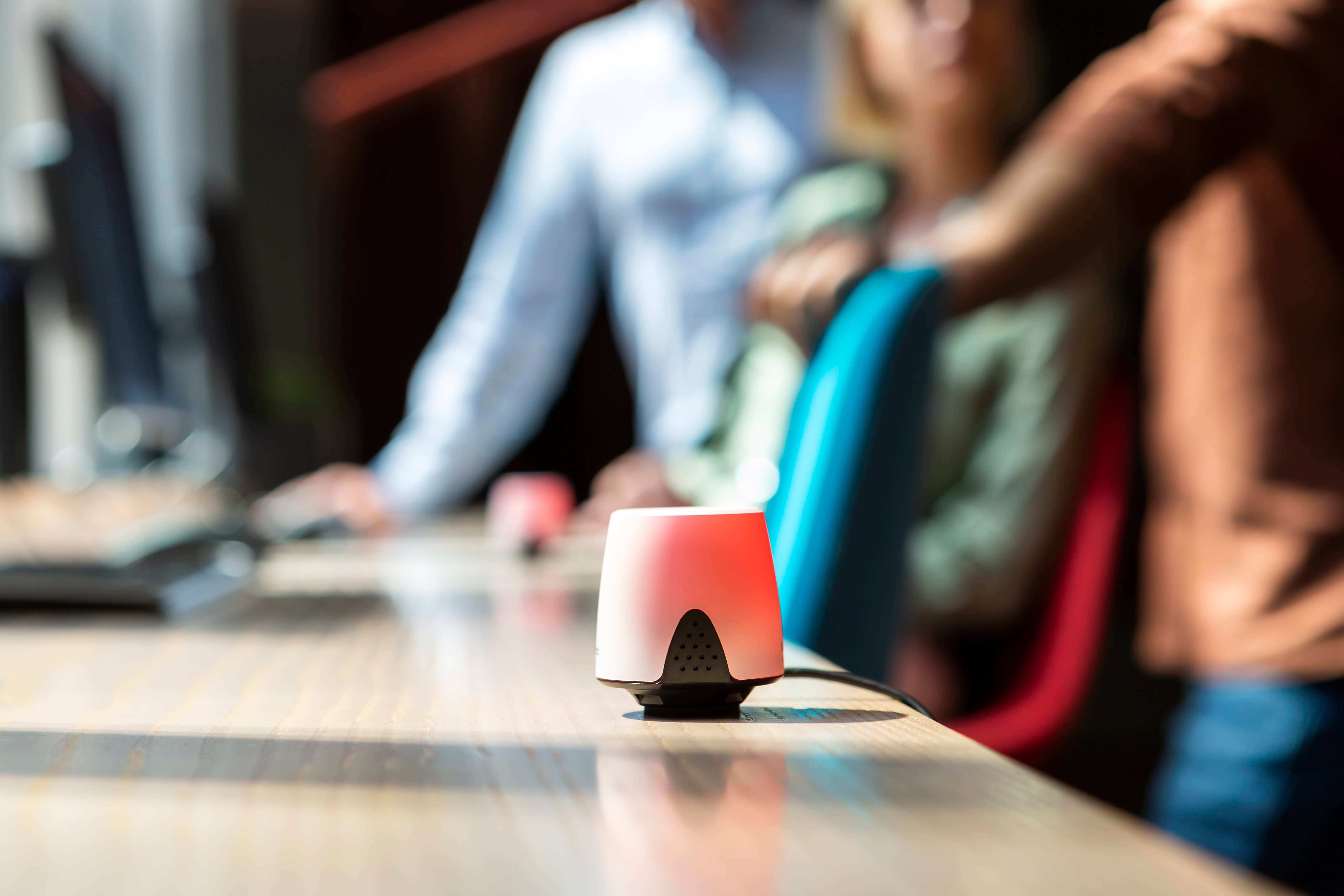 Occupied desk with red busy light