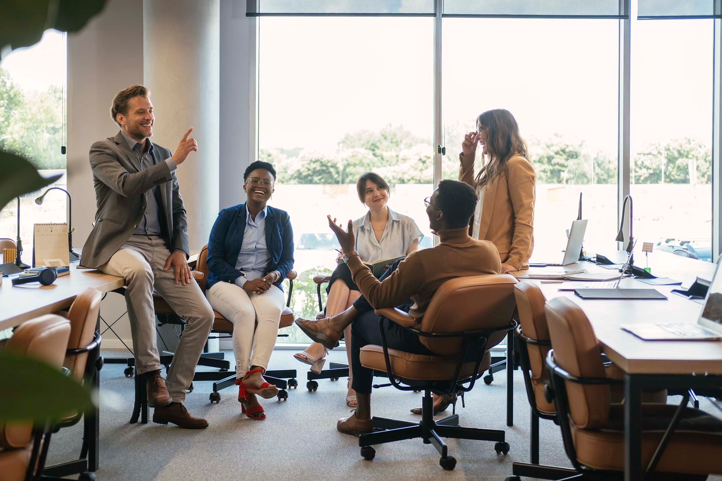 colleagues chatting in office
