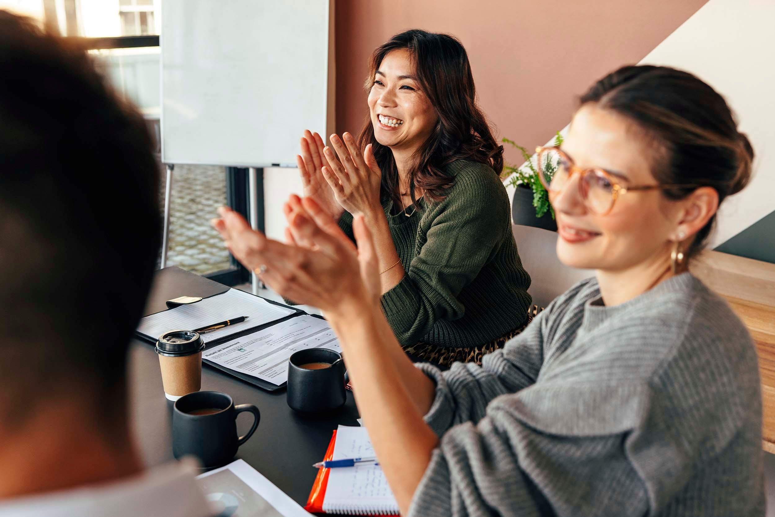colleagues clapping