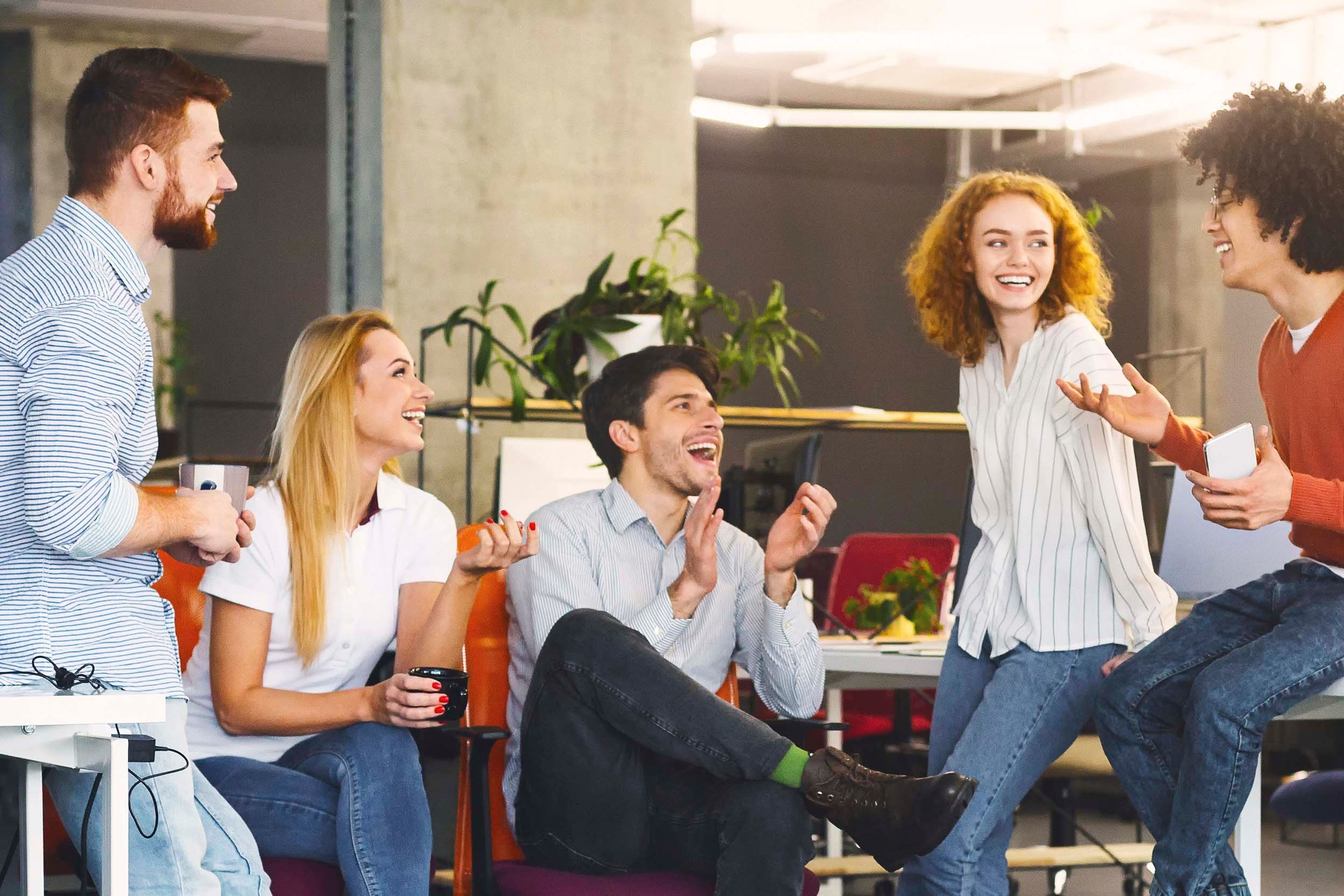 colleagues lauging at table