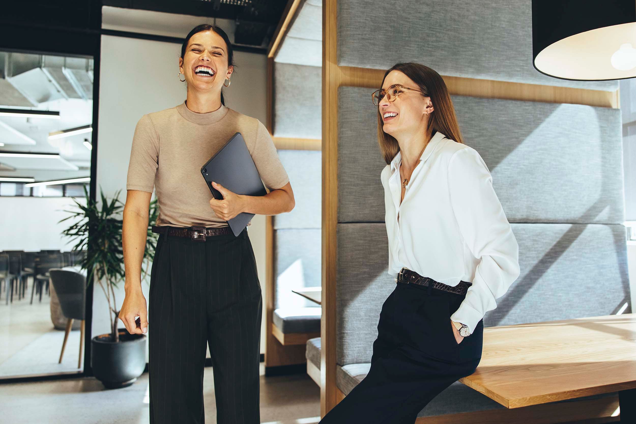 Two colleagues having fun in the office - general