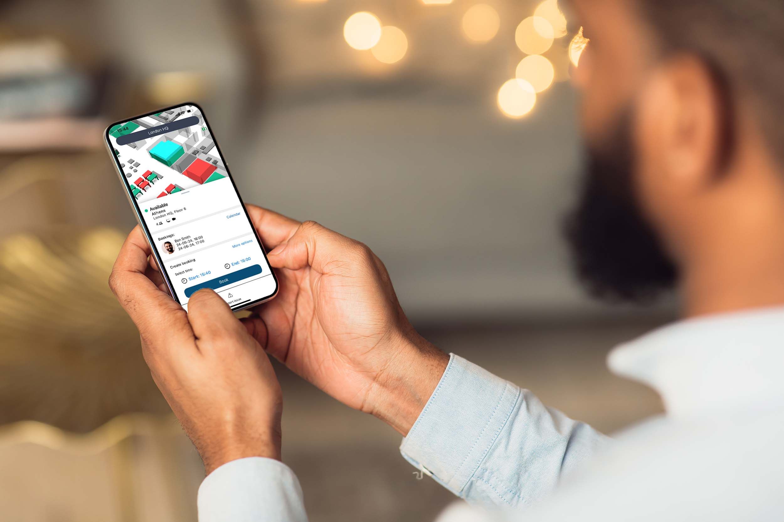 Man with Flowscape app open in phone