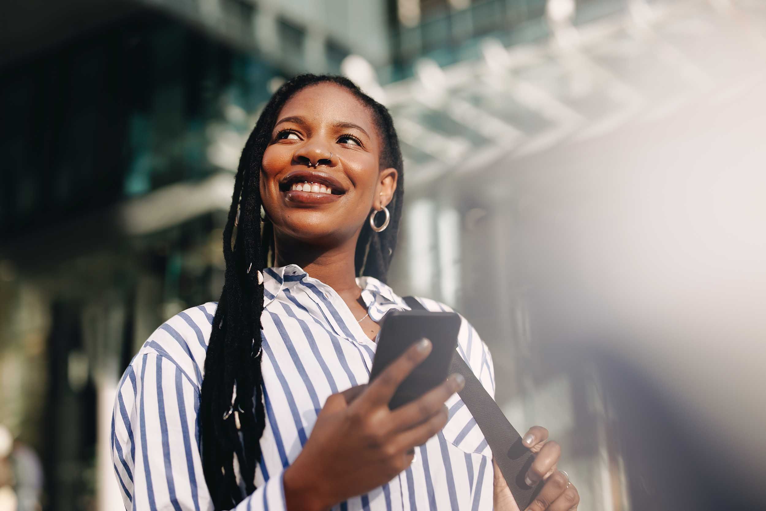 woman happy with her phone