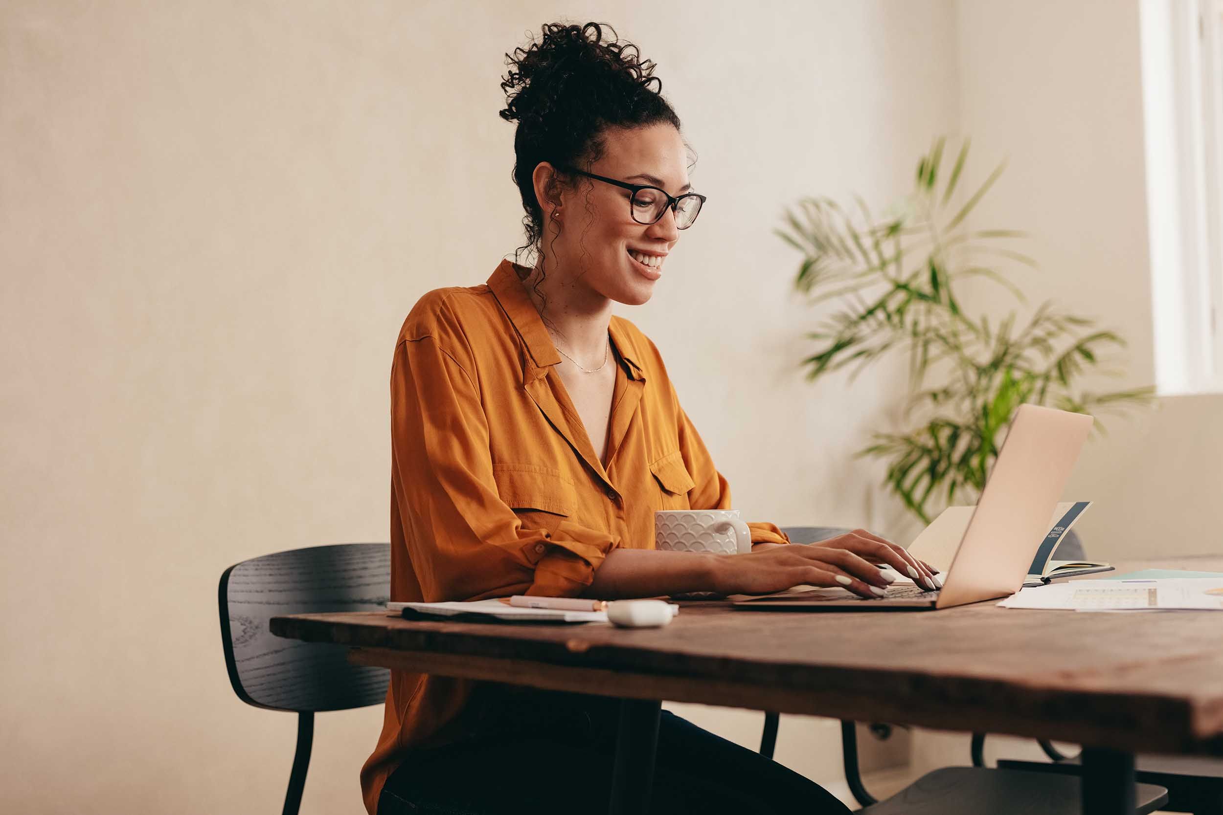 woman working at home from a table