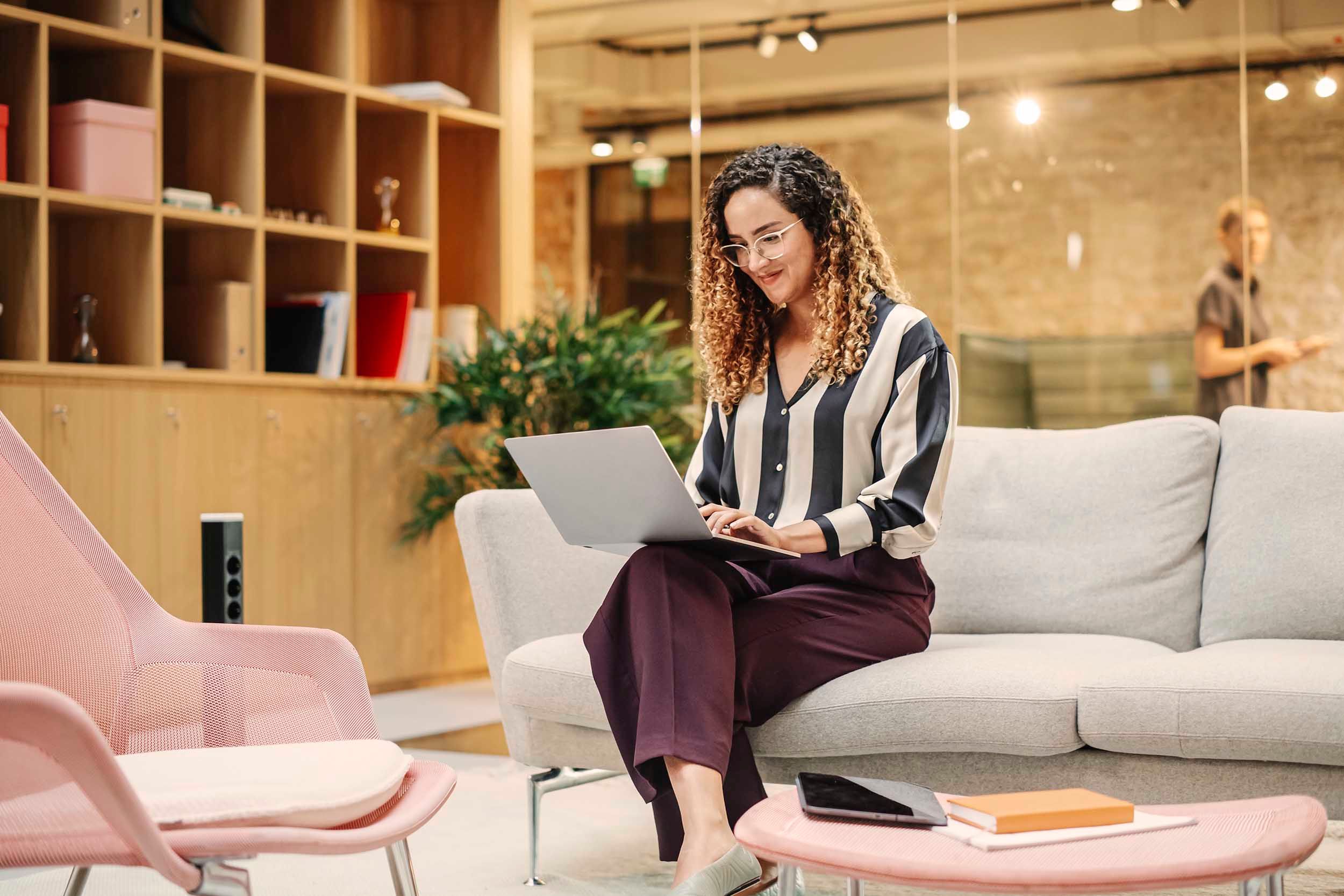 woman working in lounge area
