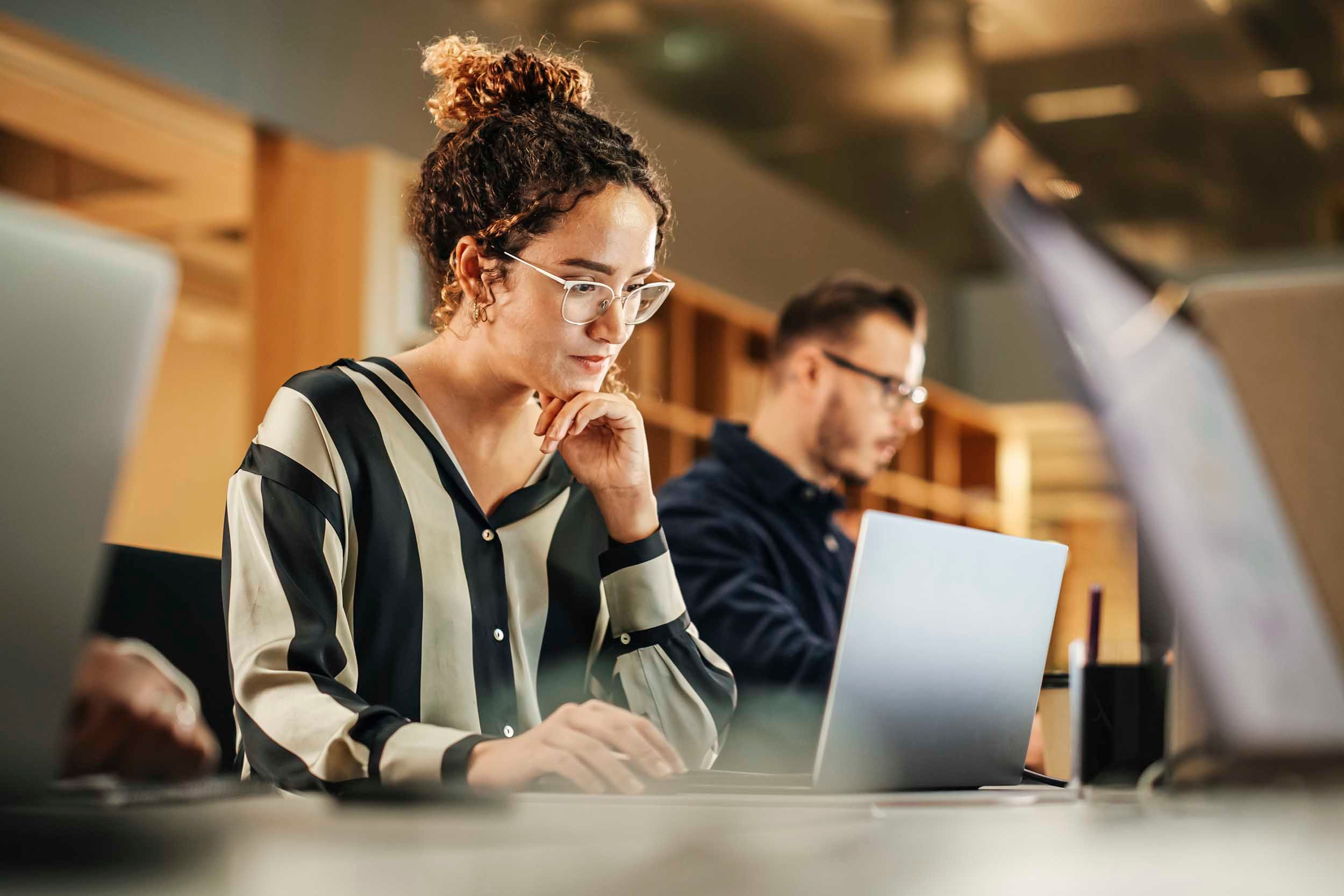 woman working infront of computer